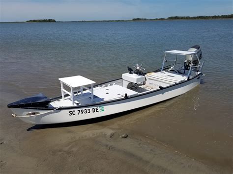 Shes a great boat-25hp tohatsu 2017-garmin GPS-trolling motor-stick it poles-custom aluminum work-blue. . Gheenoe lt25 for sale
